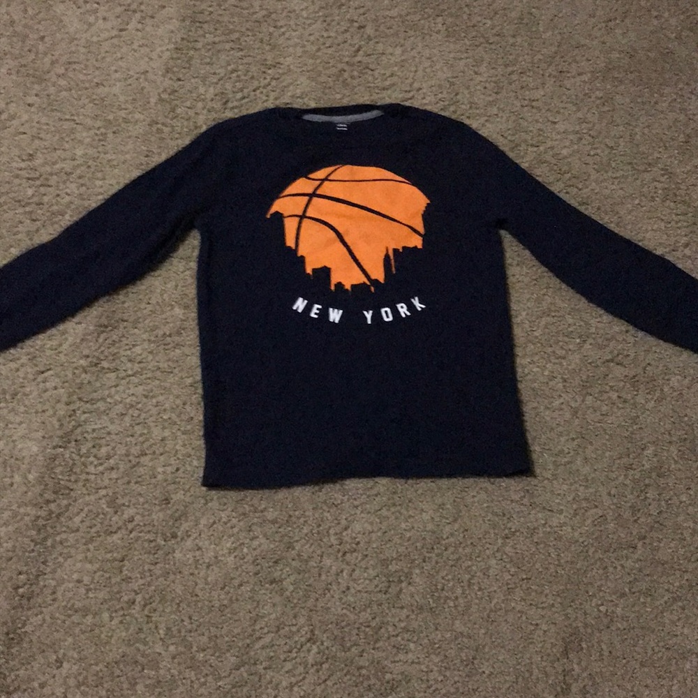 A boys basketball tee